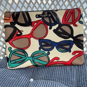 Kate Spade Sunglasses coated canvas clutch bag
